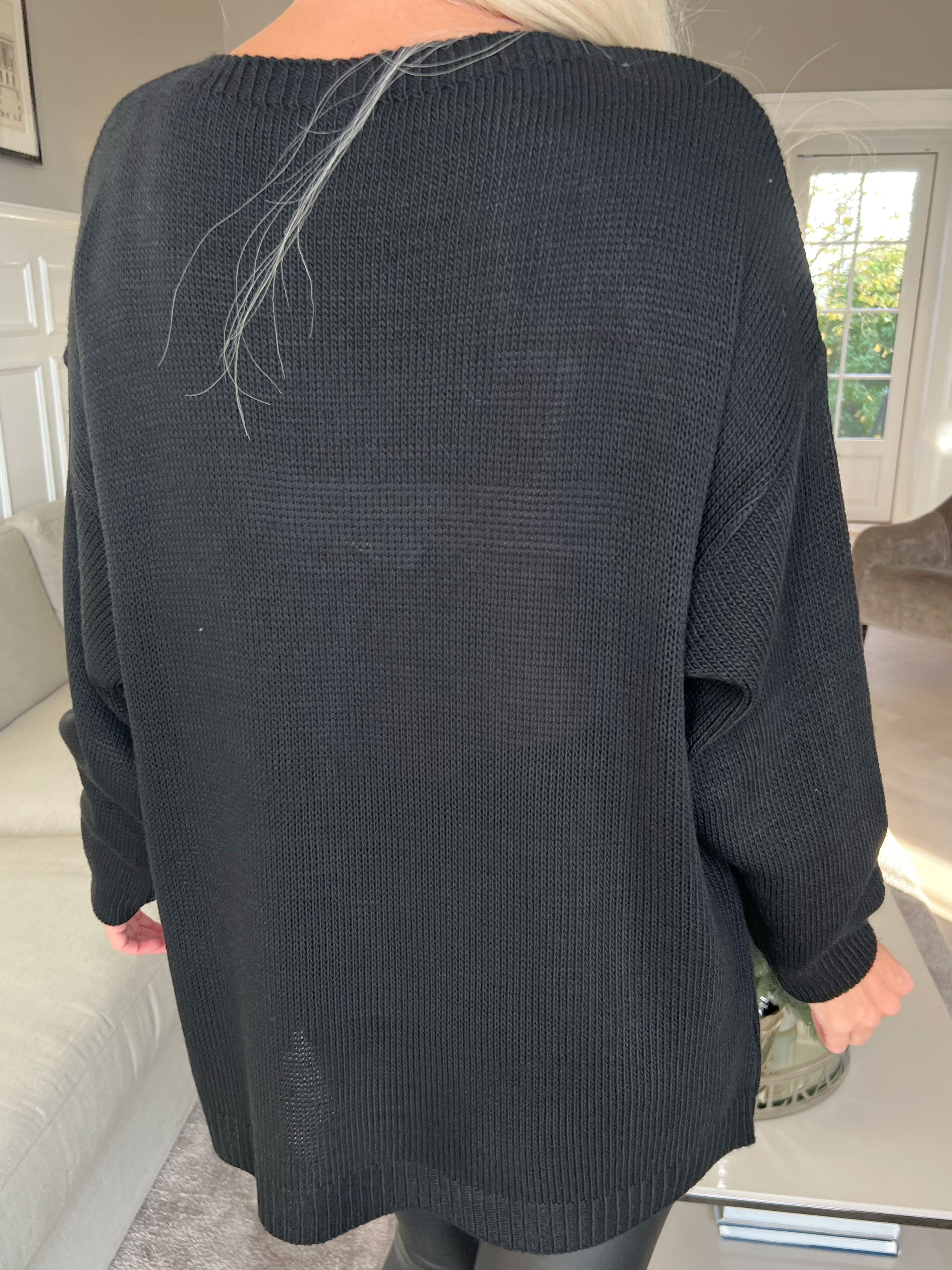 Mia - Strikbluse med firkløver på